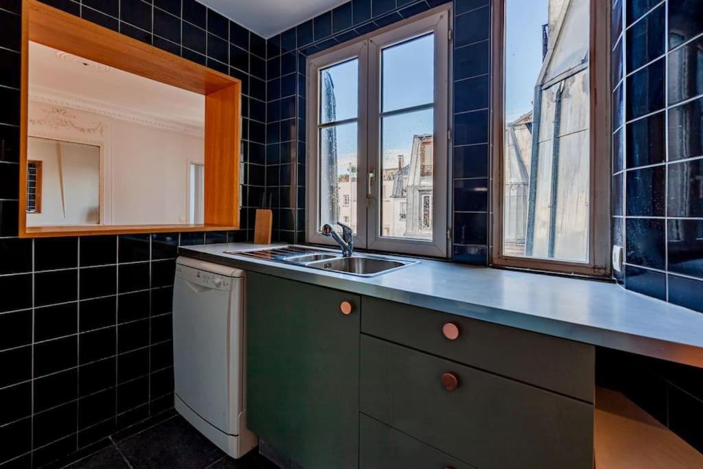 Charmant Appartement Au Coeur De Paris Bagian luar foto