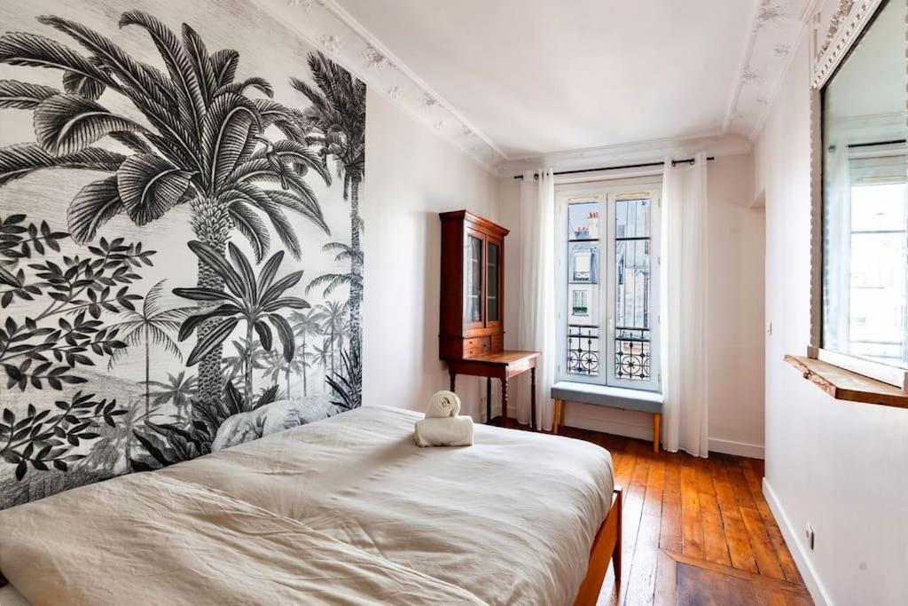 Charmant Appartement Au Coeur De Paris Bagian luar foto